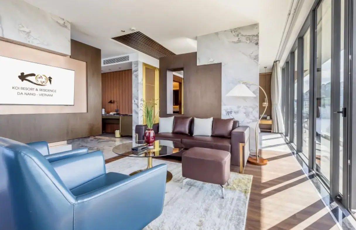 Modern living room of a Da Nang sea view villa with large windows and natural light