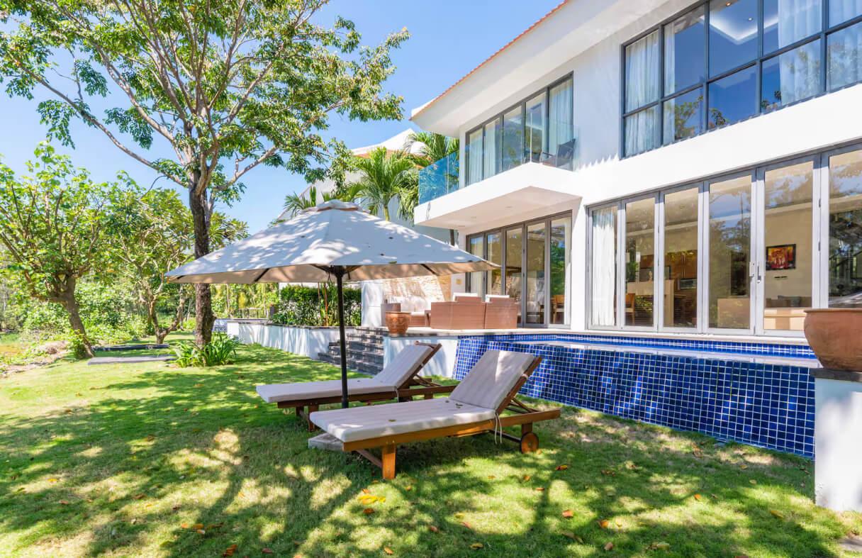 Group of friends enjoying a private villa with pool and garden in Da Nang