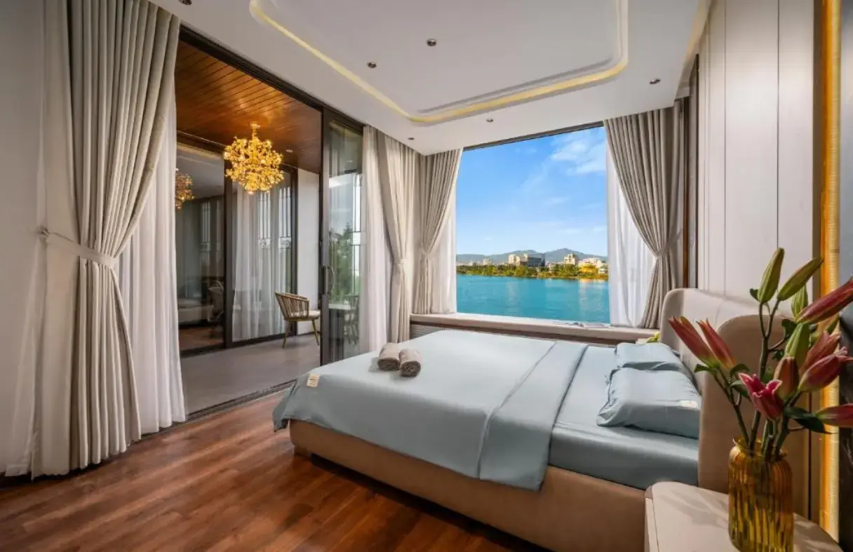 River view bedroom in a Da Nang riverside villa